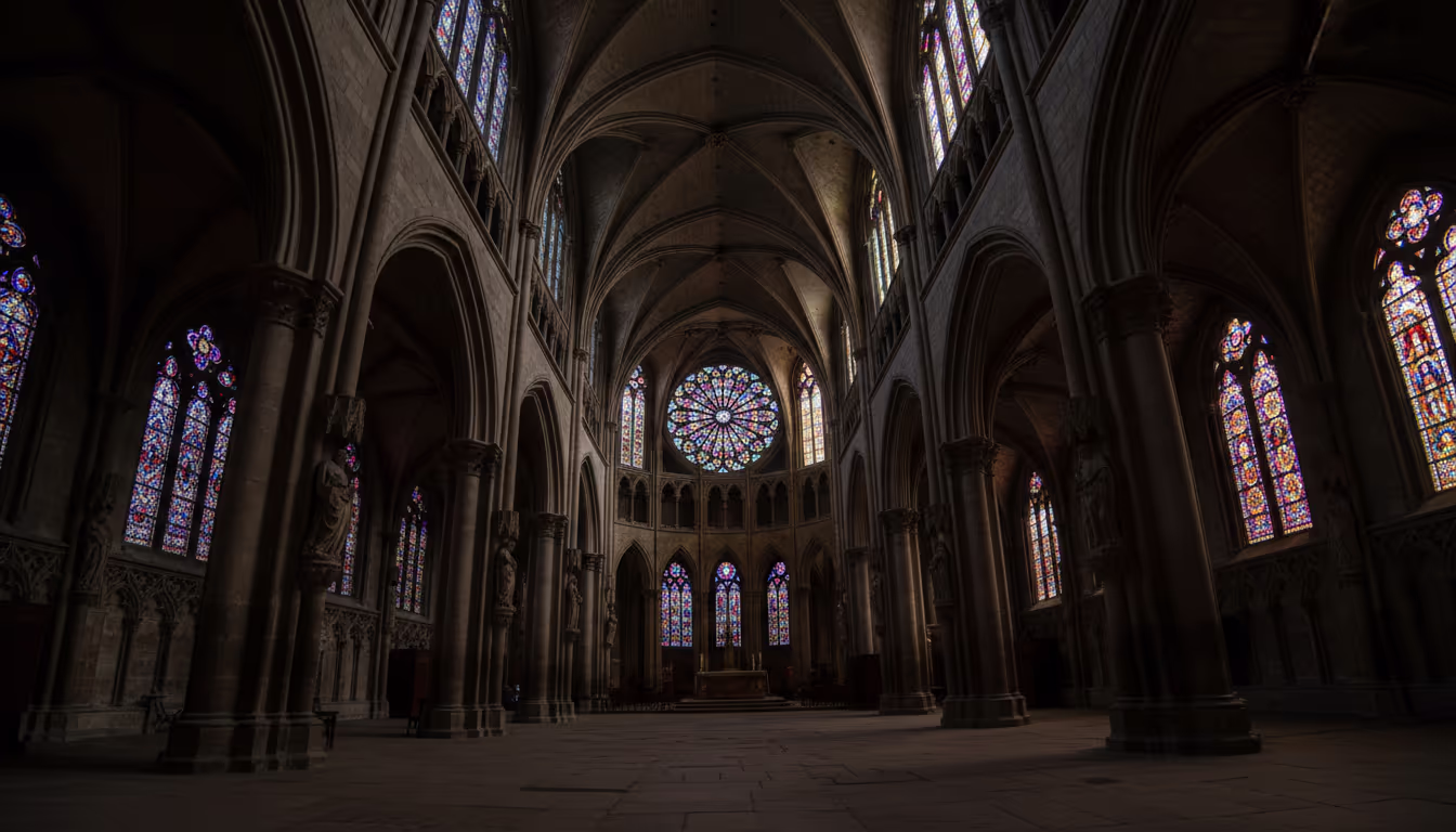 Gothic cathedral interior — soaring ribbed vaults, rose window casting colored light, stone columns reaching skyward