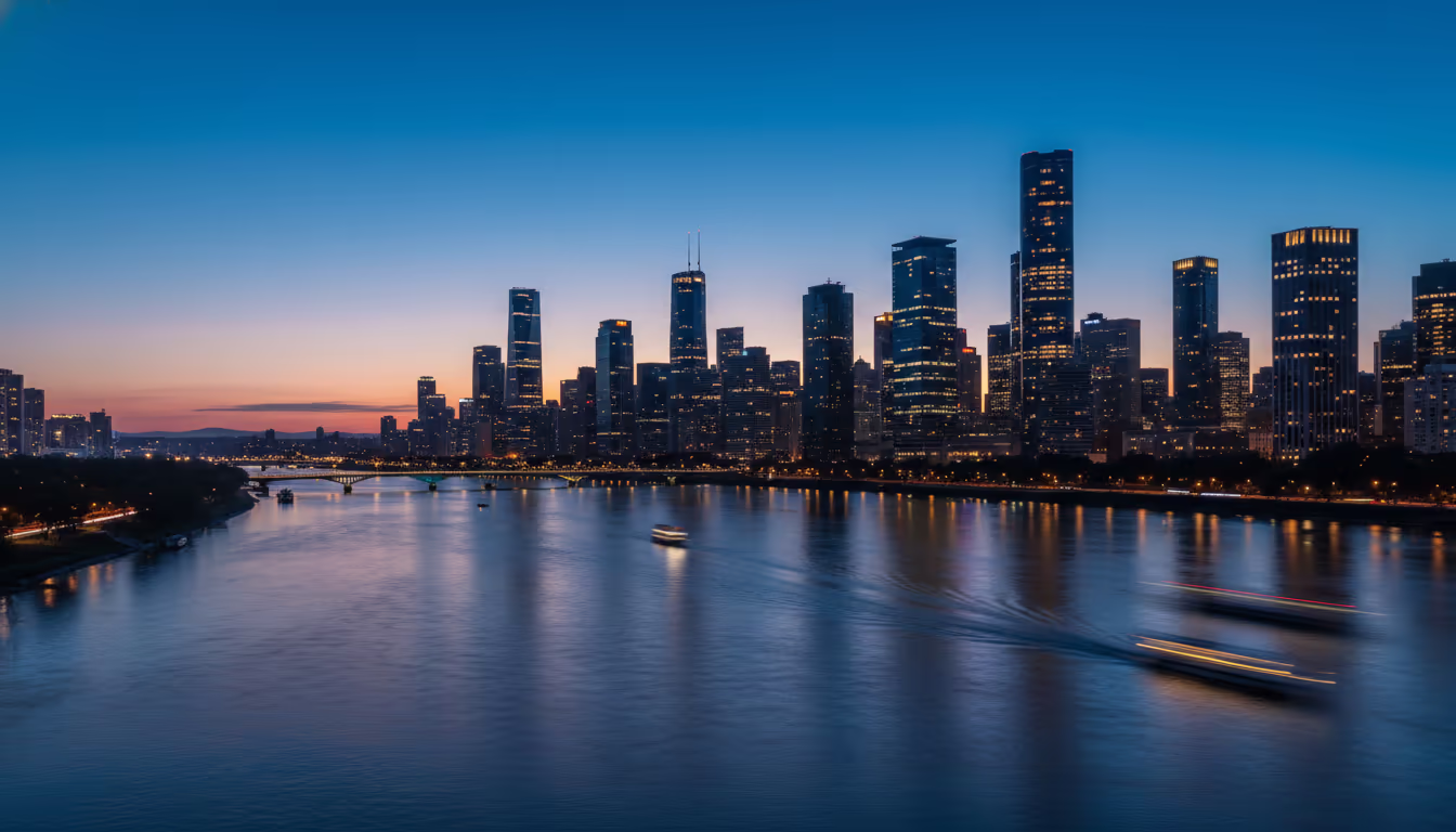 City skyline during blue hour — the magical deep blue sky between sunset and darkness, first city lights appearing