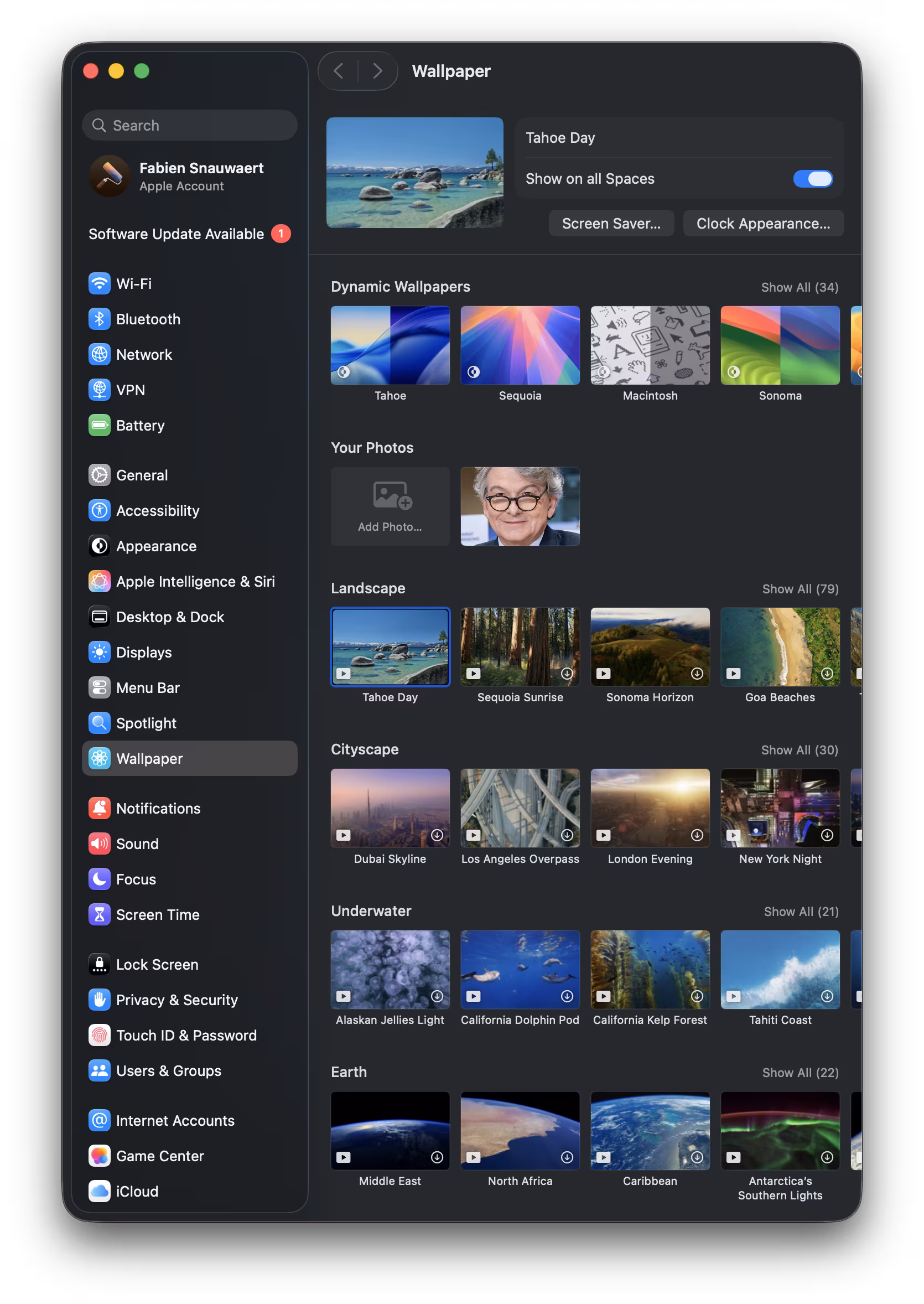 System Settings Wallpaper pane showing Apple's wallpaper categories
